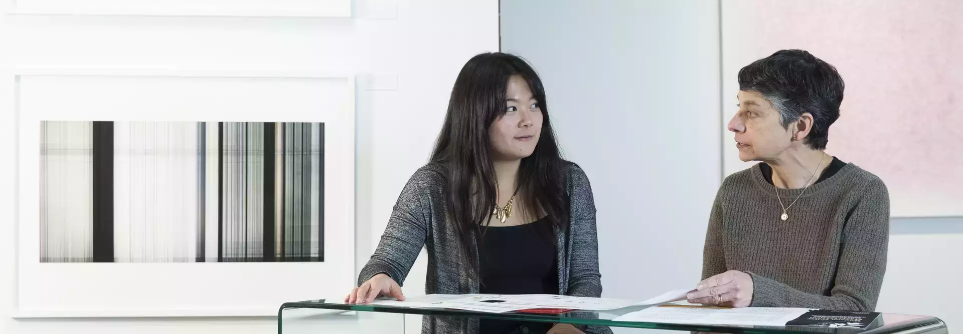 Student sitting with with an advisor