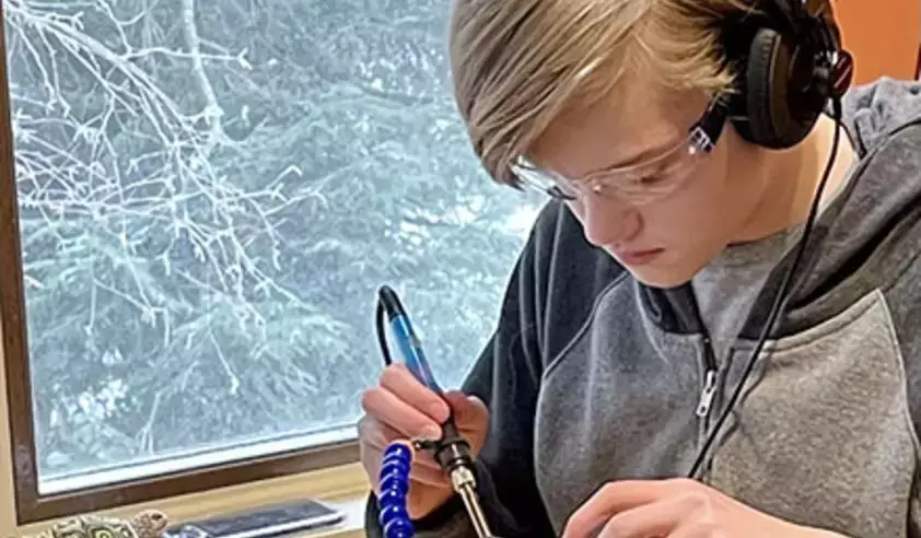 Go STEM student soldering