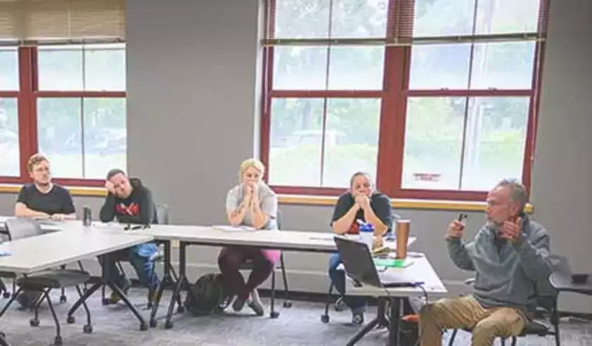 Springbrook Program Lets Staff Earn College Credits