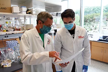Nicholas Baker and Assistant Professor Ron Bishop