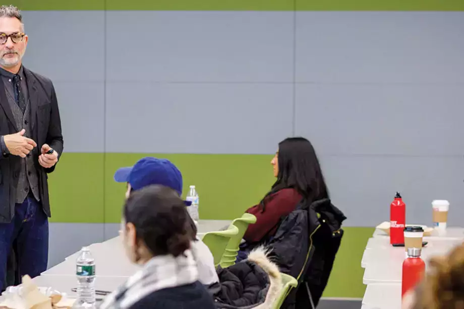 Scott Saltzman speaks to a fashion class