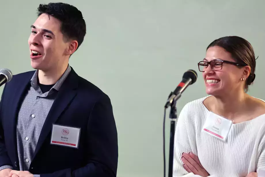 Students Bobby and Jianna receiving scholarships.