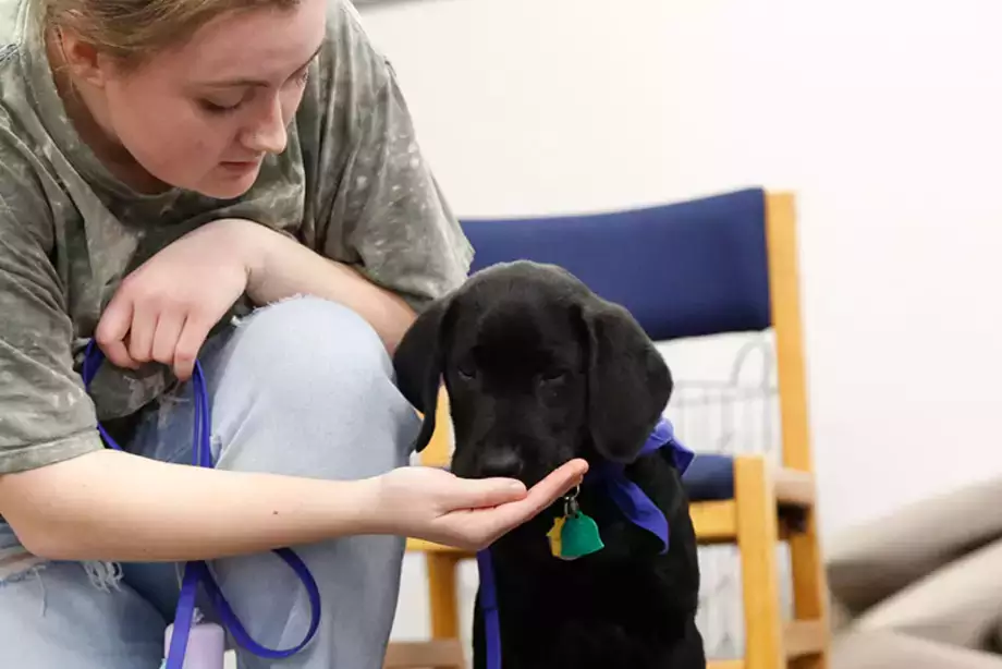 Student with Puppy