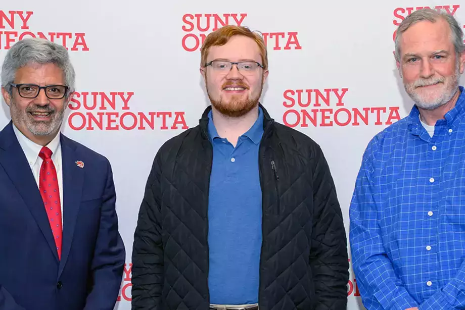 Dr. Alberto Cardelle, Andrew Lutz, and Dr. Hugh Gallager at the 2025 Academic Achievement awards ceremony