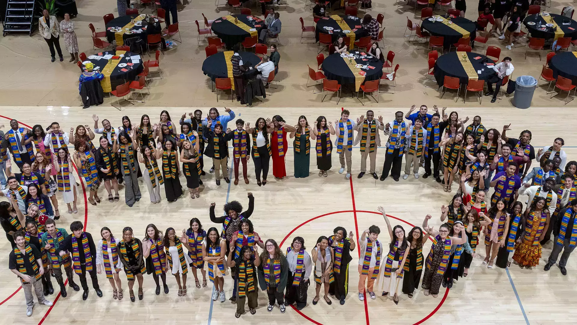 Students participate in the Kente Graduation Celebration.