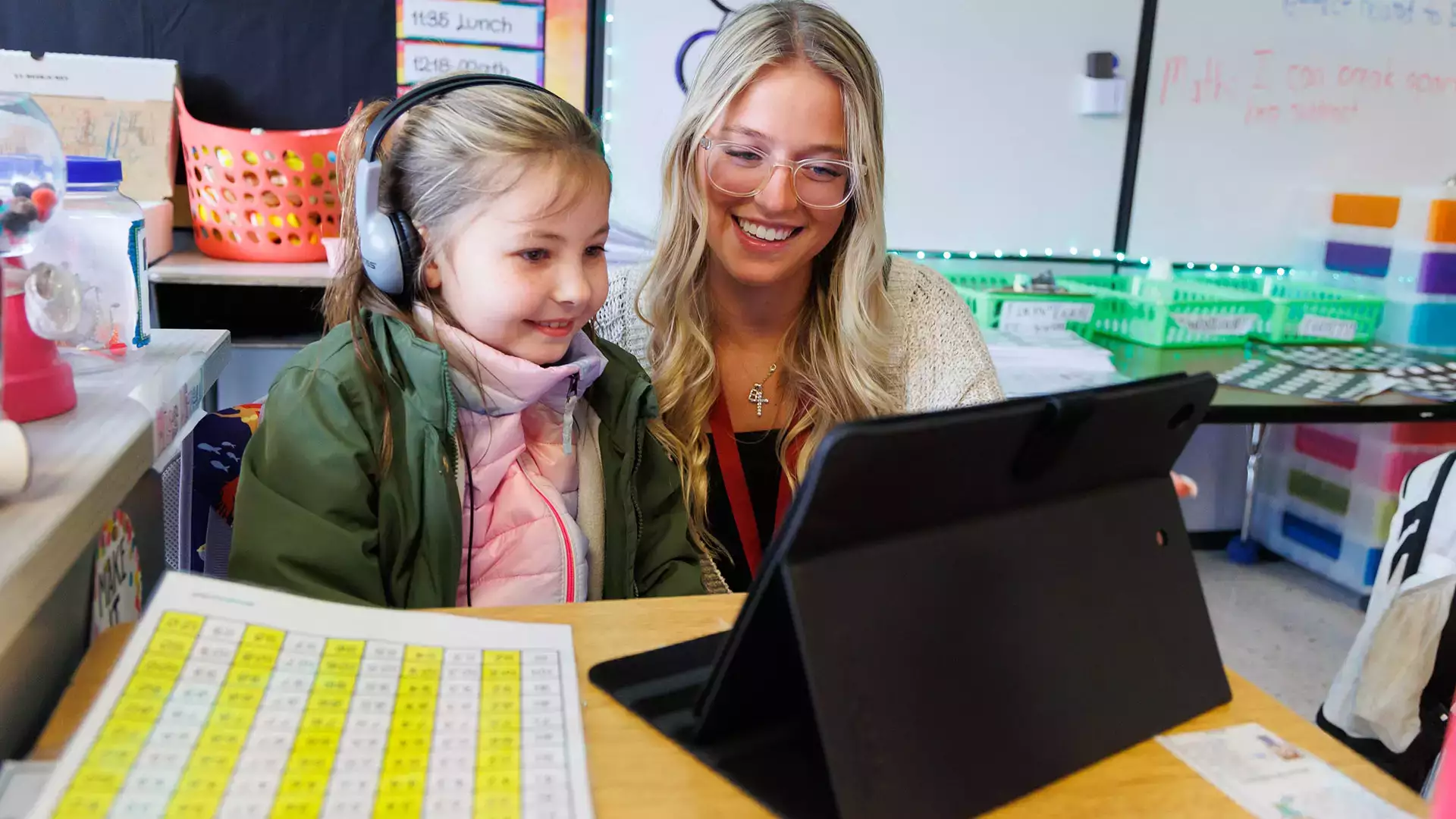 Student teacher working on-on-one with a young child.