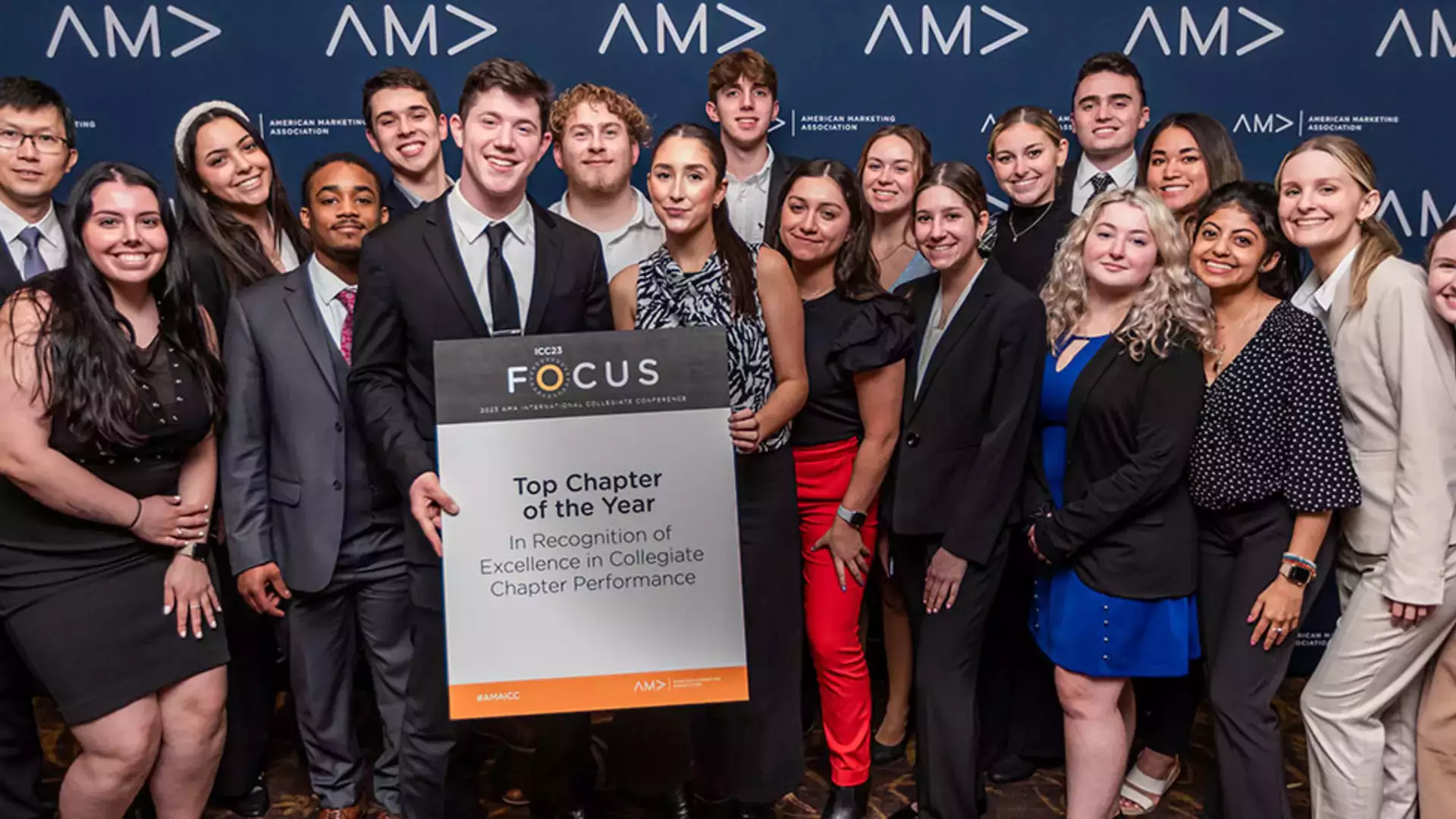 OnMark Marketing Club students pose for a group photo with their Top Chapter of the Year recognition.