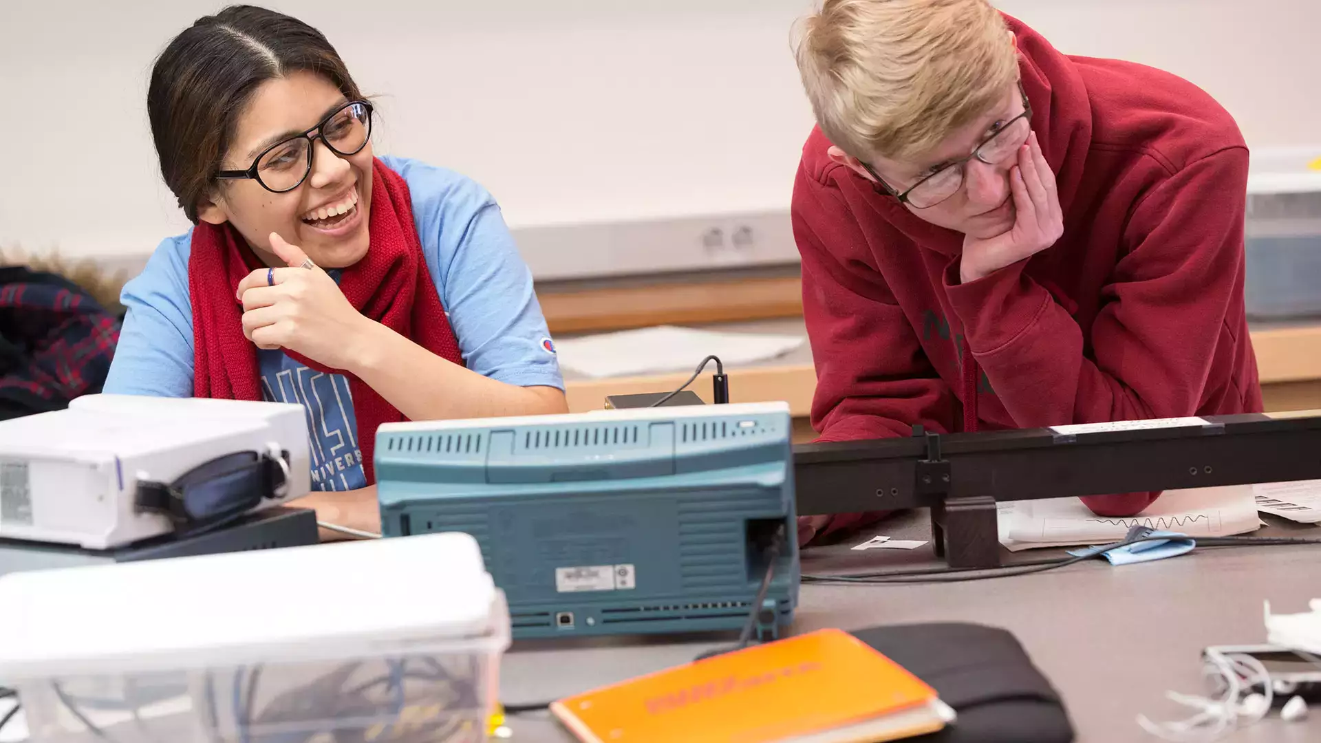 Students enjoying physics lab class