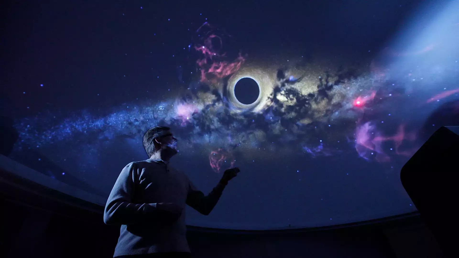 Assistant Professor of Physics & Astronomy Josh Nollenberg lectures to his “Big Bang and the Formation of the Universe” class