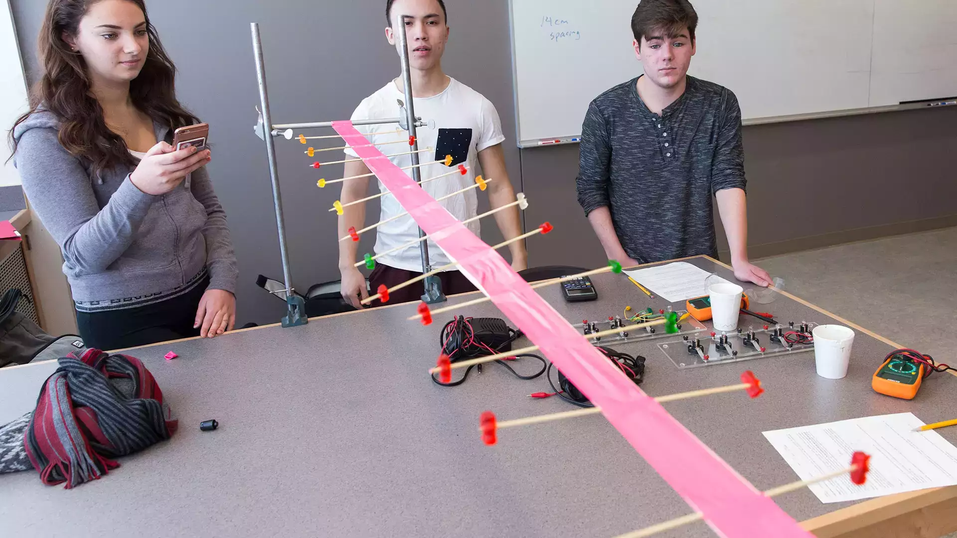 Students learn about wave motion by building a “Jelly Belly Wave Machine.”