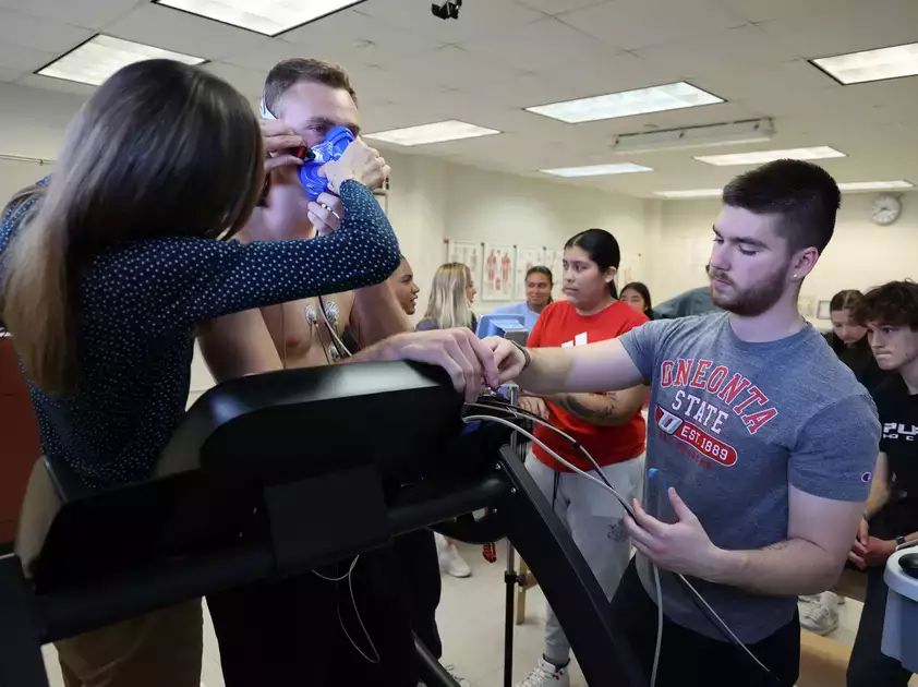 Prepping a subject in the Exercise Testing and Prescription Lab