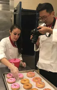 JP and Julia working in kitchen